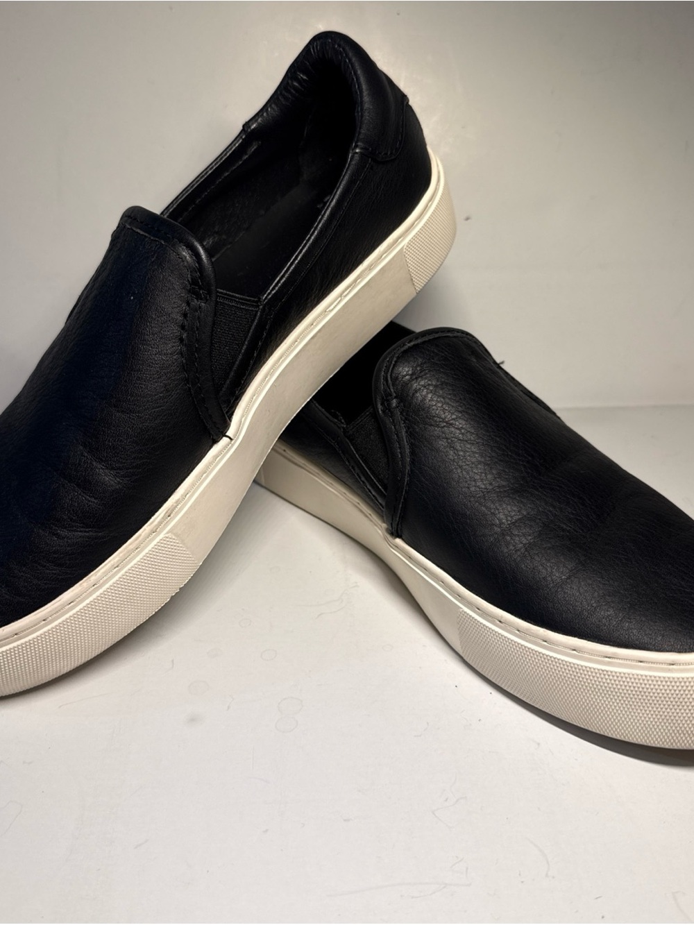 UGG Black Leather Slip-On Sneakers with Cream Platform